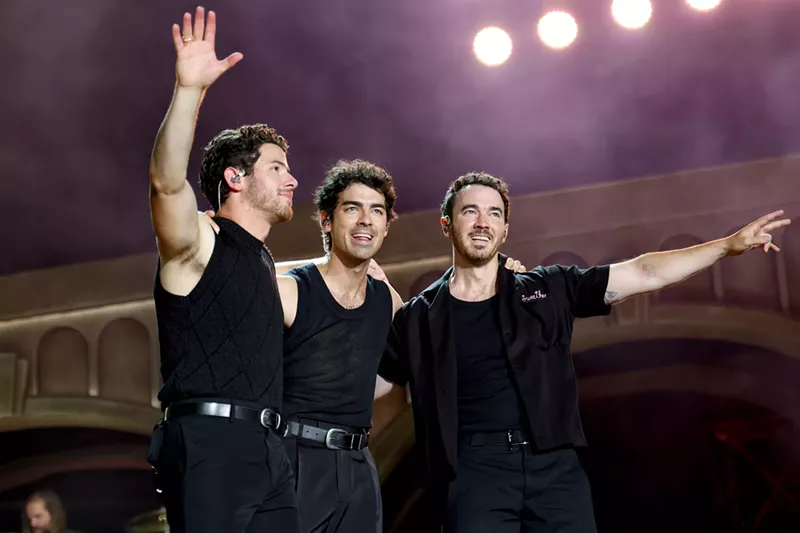 Image: Brothers performing on stage
