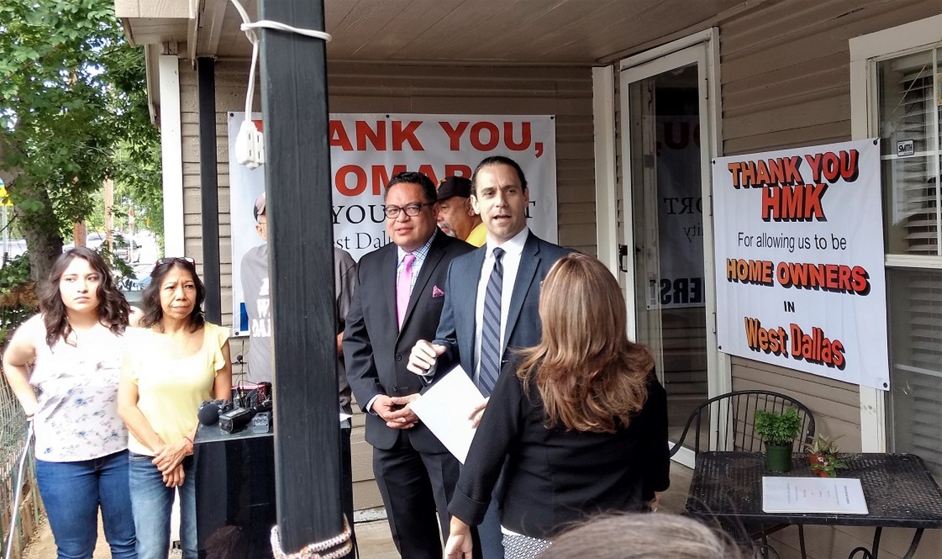 City Council candidate Omar Narvaez (left) and Khraish Khraish announced Monday the planned sale of 130 West Dallas houses to current tenants.
