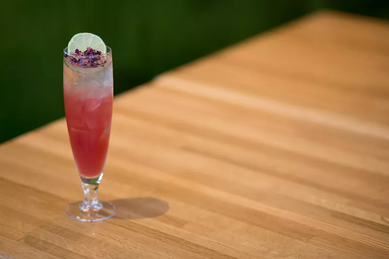 Image: Who needs a dozen roses? Just one will do ... if it's the garnish in this cocktail.