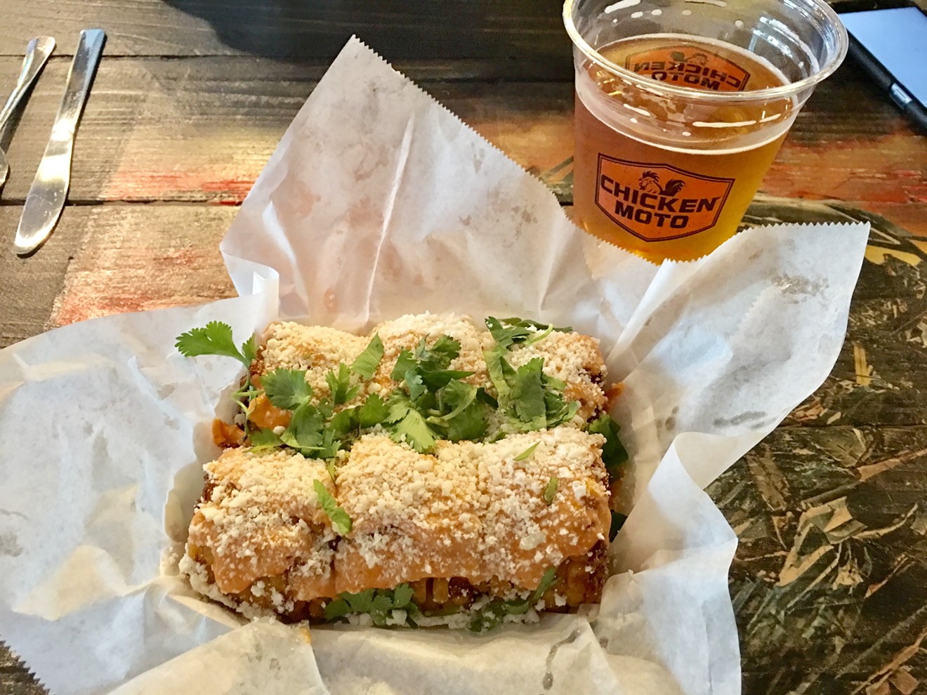 Chicken Moto's Texas-Korea fusion is most apparent in the elotes, made with Korean pepper-spiced mayonnaise and cotija cheese.