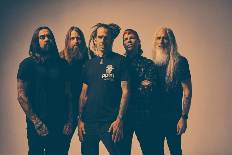 Image: Lamb of God vocalist Randy Blythe (center) urges you to drink plenty of water.