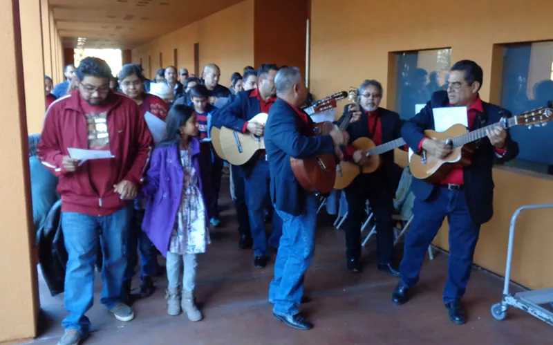 Image: A posada always involves a procession with music.