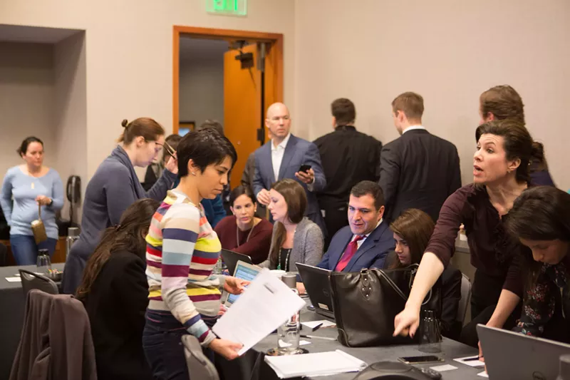 Image: Lawyers in their makeshift war room at Dallas/Fort Worth International Airport.