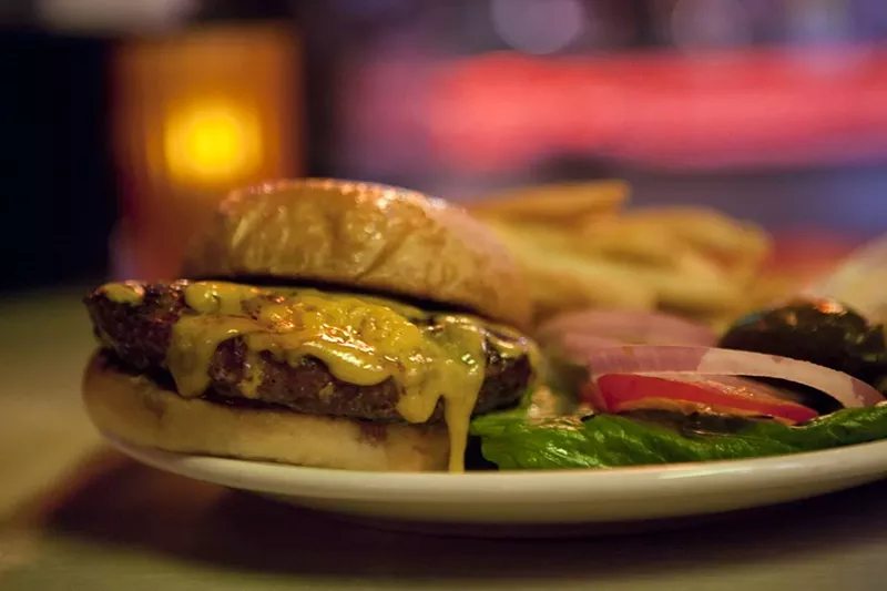 Image: Cheeseburgers and onion rings have been Lee Harvey's staple for years.
