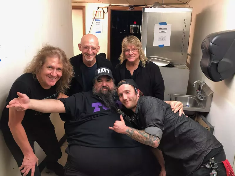 Image: Big Mike (bottom, middle) is retiring after years of living the dream booking shows in Dallas.