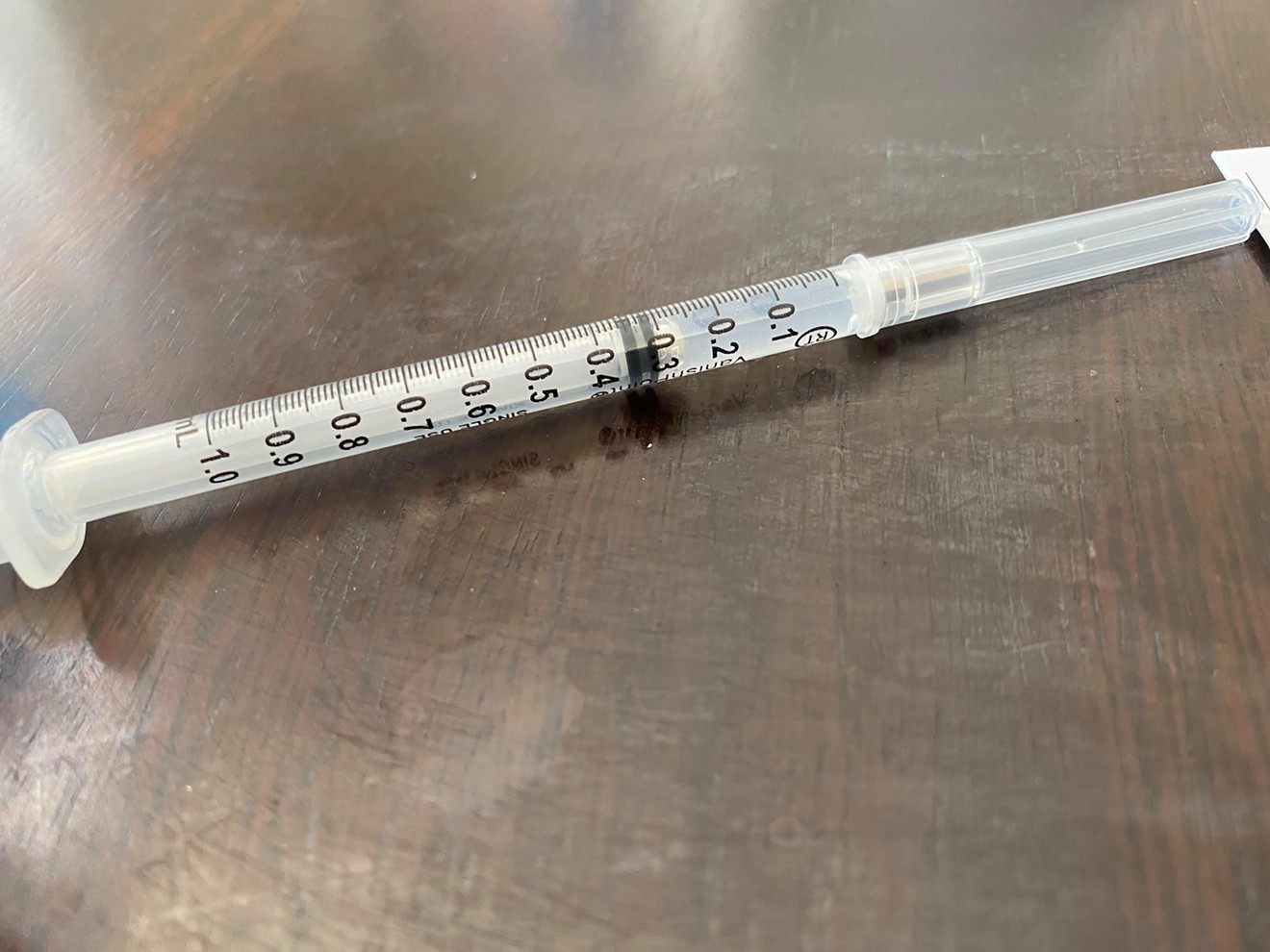 A COVID-19 vaccination shot recently administered at a longterm care facility.