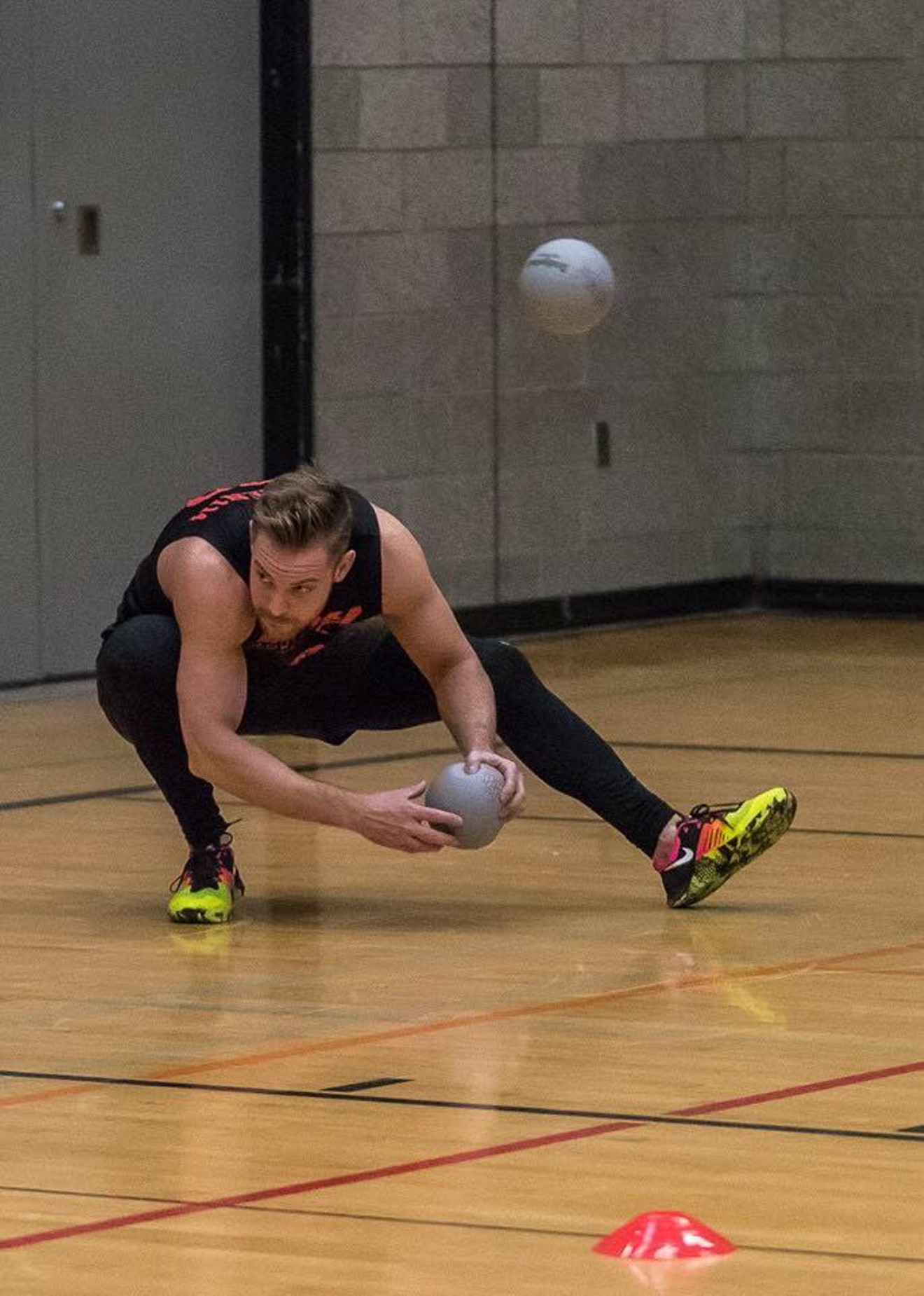 A player competes in a game in Seattle in the National Gay Dodgeball League, which has a group of teams in Dallas.