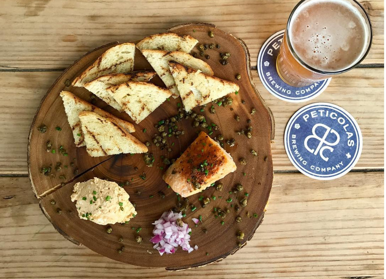 18th & Vine serves its adorable new summer special — a smoked salmon board with dill aioli, fried capers and grilled toast — on this rustic wooden circle. Count the rings for added dinner entertainment.