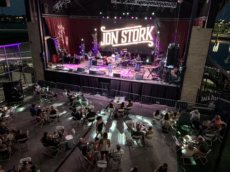 Image: Dinner and a show: Socially distanced concertgoers watch Jon Stork perform at Lava Cantina Saturday August 15.