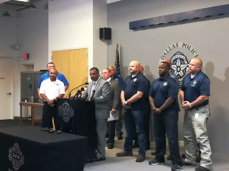 Image: Dallas Police Association President Mike Mata speaks to reporters on Thursday.