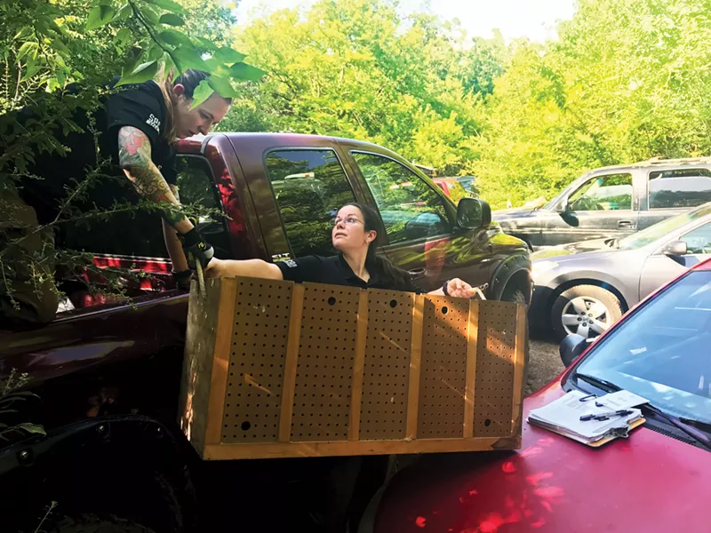 Image: SPCA of Texas staff clean up an illegal cockfighting location in Dallas County.