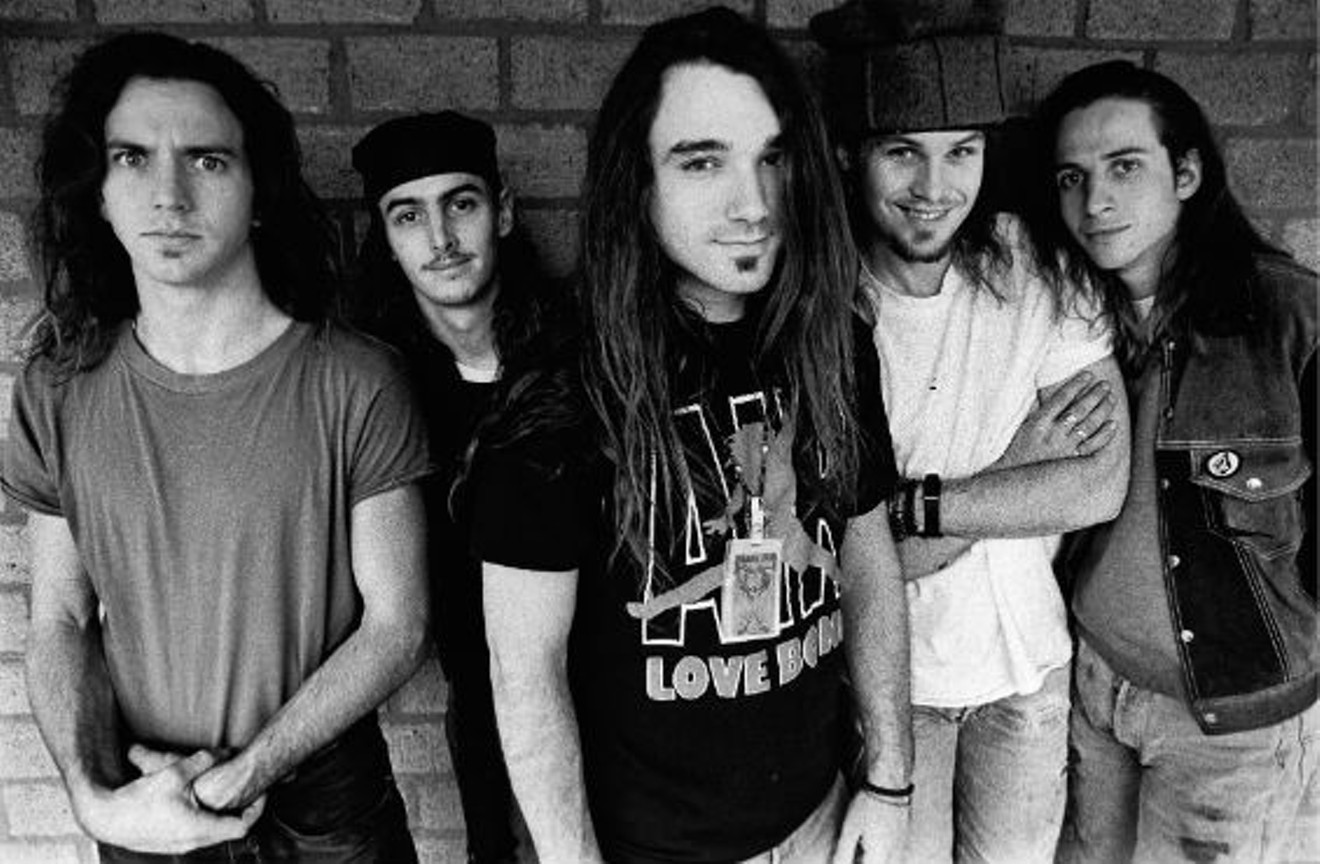 Drummer Dave Abbruzzese (center), who grew up in Mesquite, with Pearl Jam in the '90s. Although he was a fan favorite during his tenure with the band, he won't be inducted into the Rock and Roll Hall of Fame when the rest of the members shown receive the honor.