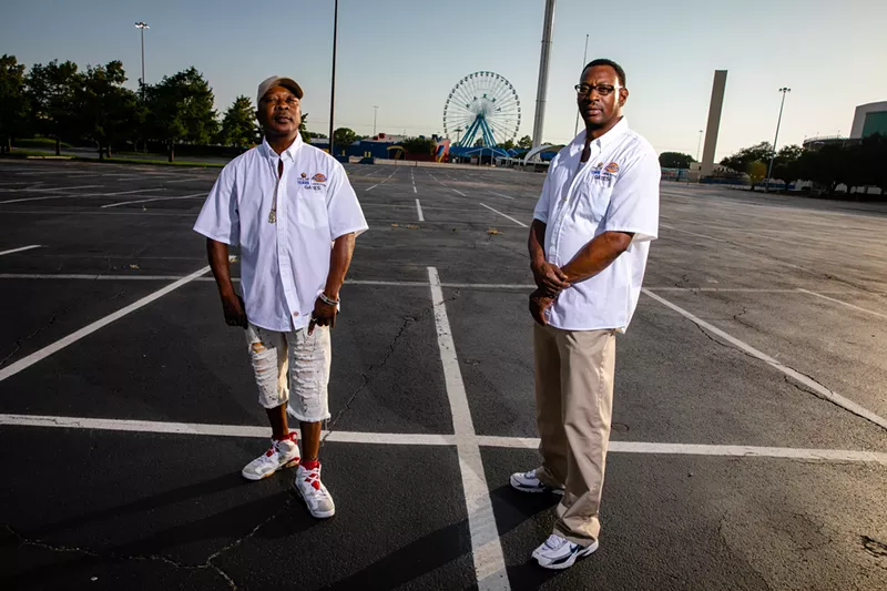 Image: Lucky Clark (left) and Perry Eakles are State Fair of Texas parking attendants who find themselves without the annual job this year.