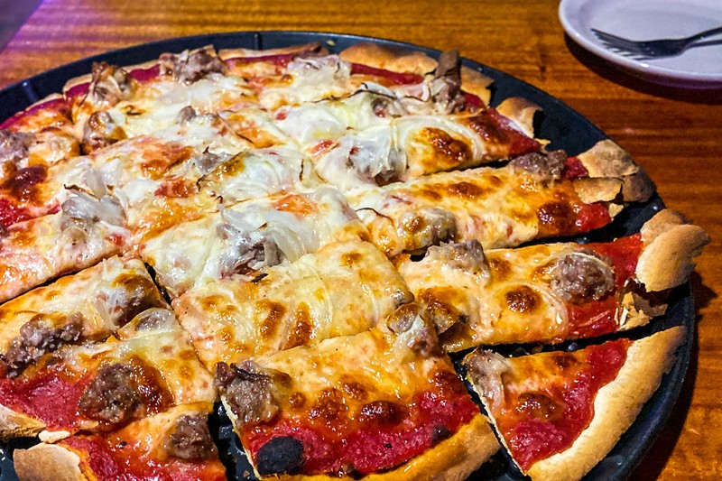 Louie's sausage and onion tavern-style thin crust pizza
