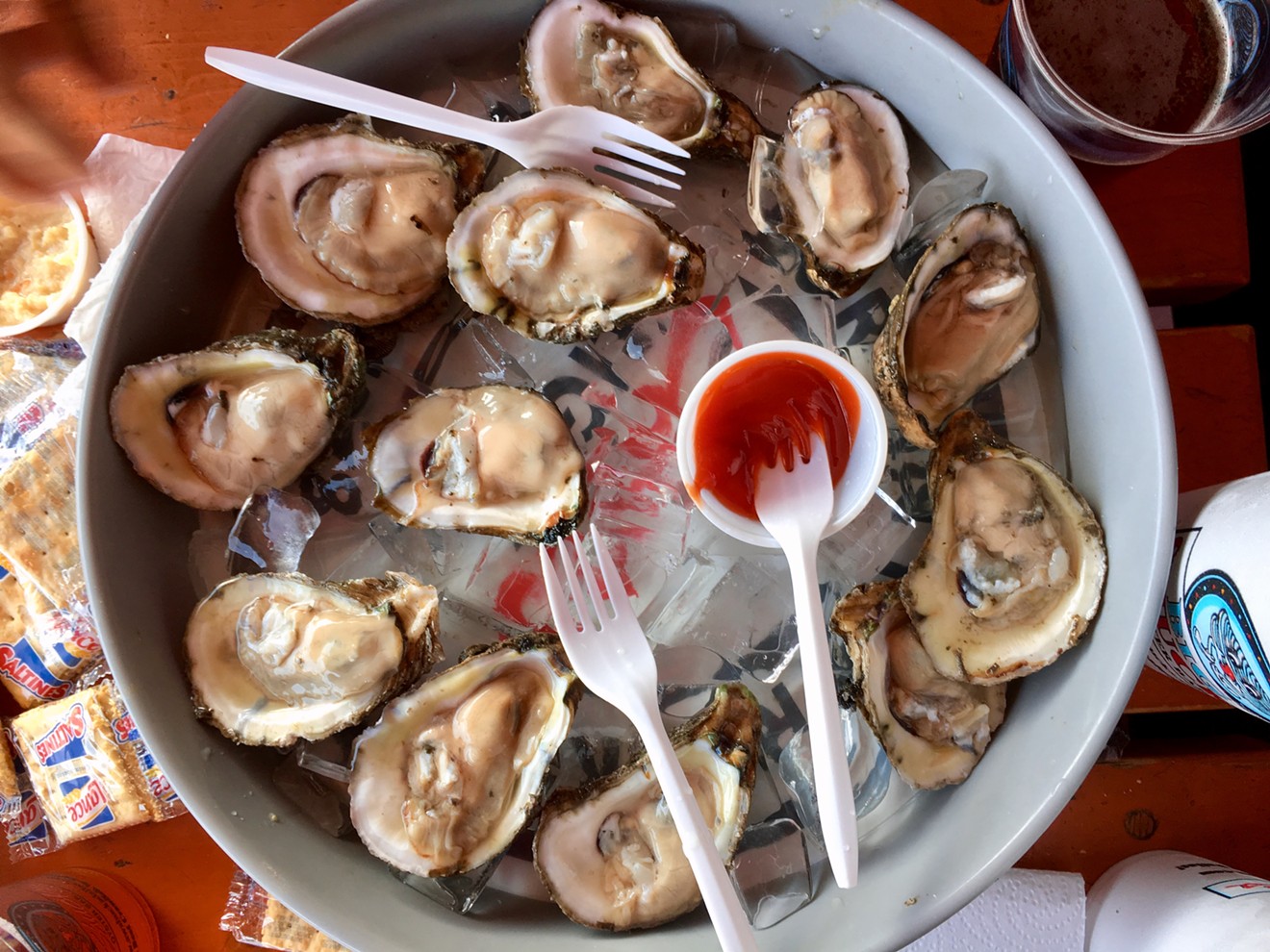 Aw Shucks has Gulf oysters for cheap ($14.99 for a dozen, half price during happy hour), and there's plenty of Saltines around for the picking.