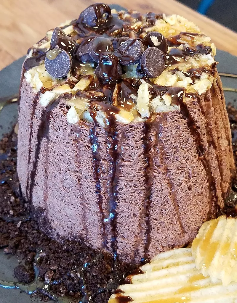 Image: "The Craving" — chocolate snow with crushed Oreos, potato chips, fudge, sea salt caramel and chocolate chips