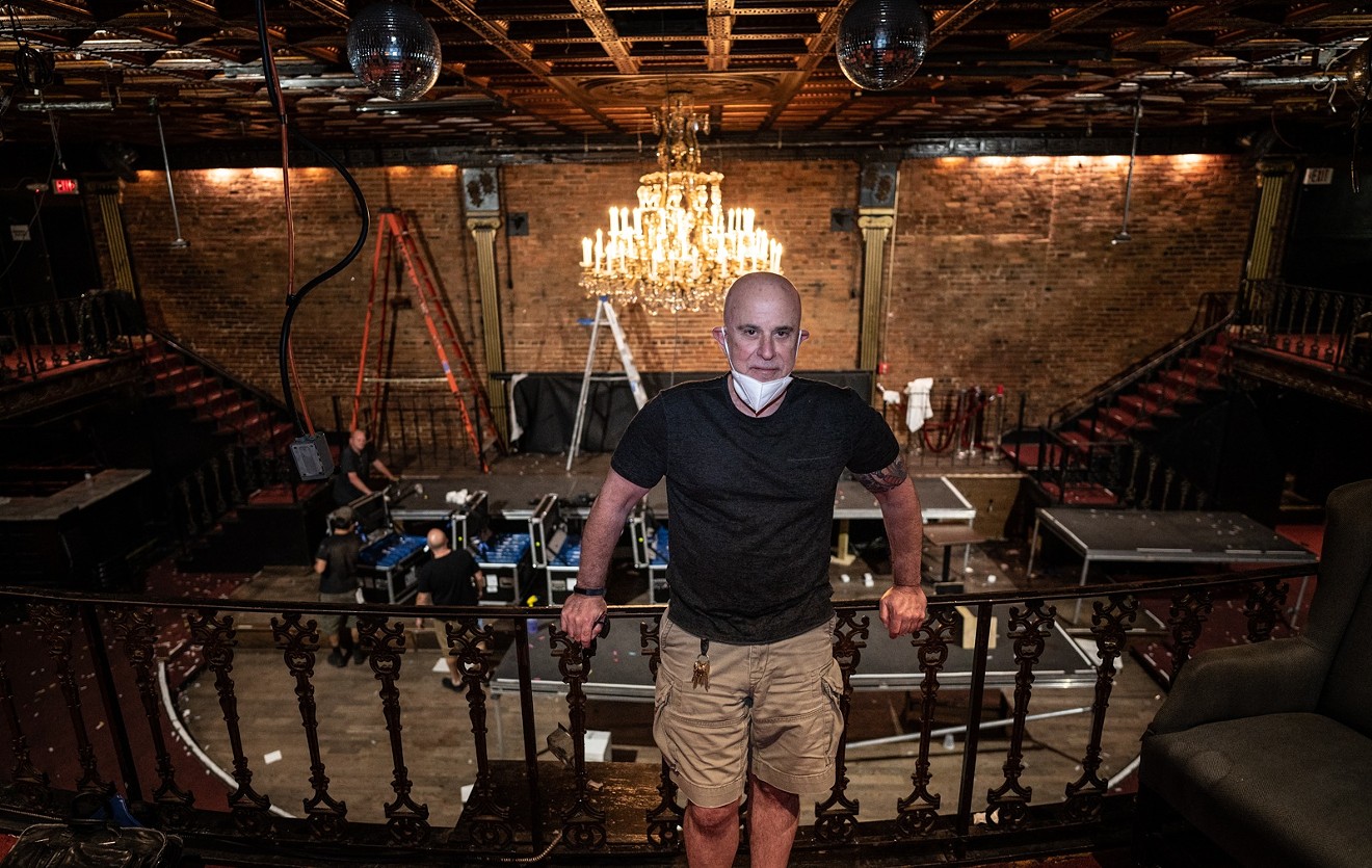 Lizard Lounge owner Don Nedler poses inside the gutted venue.