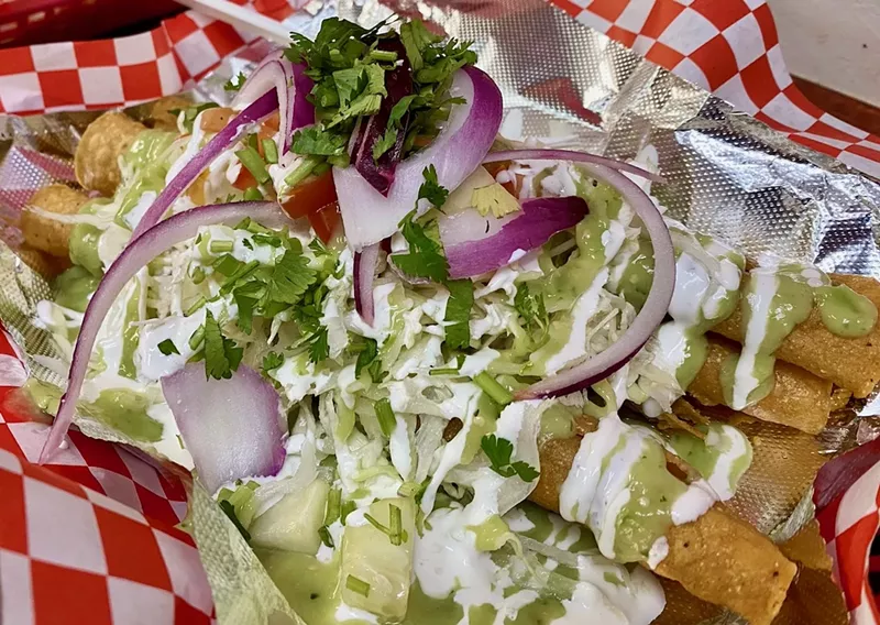 Image: The flautas at Mami Coco are the star of the show, perfectly crisp and topped with a bright salad and sauces.
