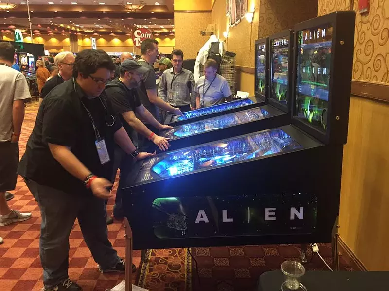 Image: Danny Gallagher testing out the new Alien machine from Heighway Pinball. It was one of the Texas Pinball Festival's biggest attractions.