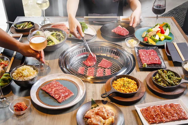 Image: At Manpuku, diners get to cook dinner for themselves.