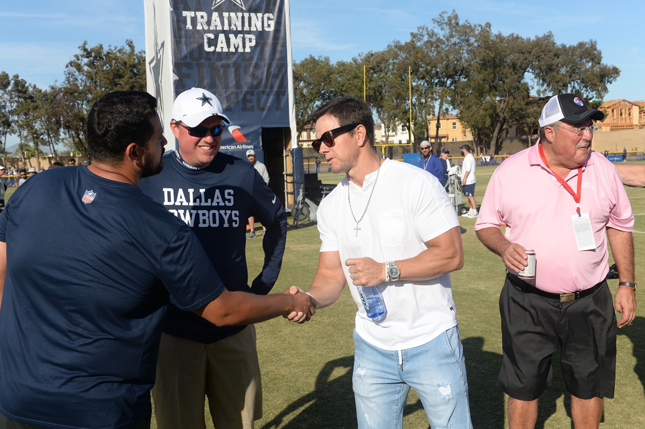 Mark Wahlberg, uh, Patriots fan, stopped by Cowboys training camp Monday in Oxnard to tip off that his restaurant was coming to Frisco.