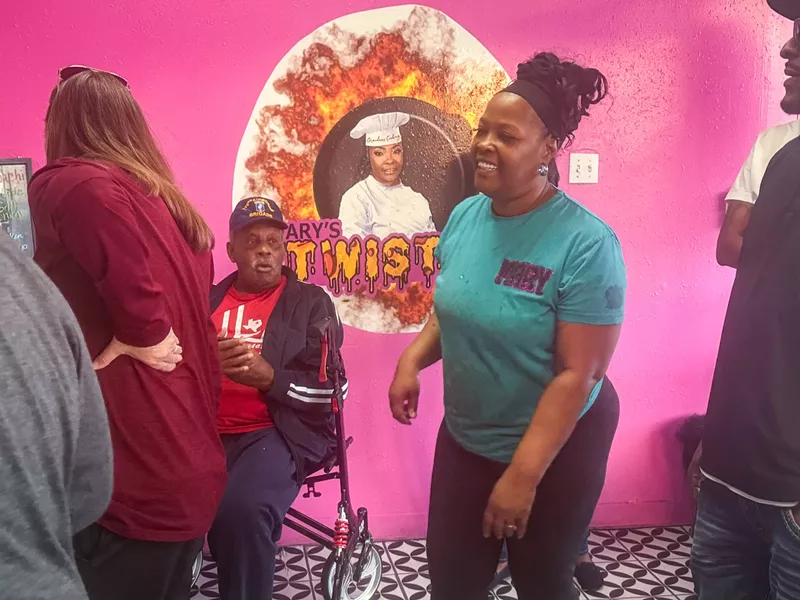Image: Mary Dudley and customers at Mary's Twisted