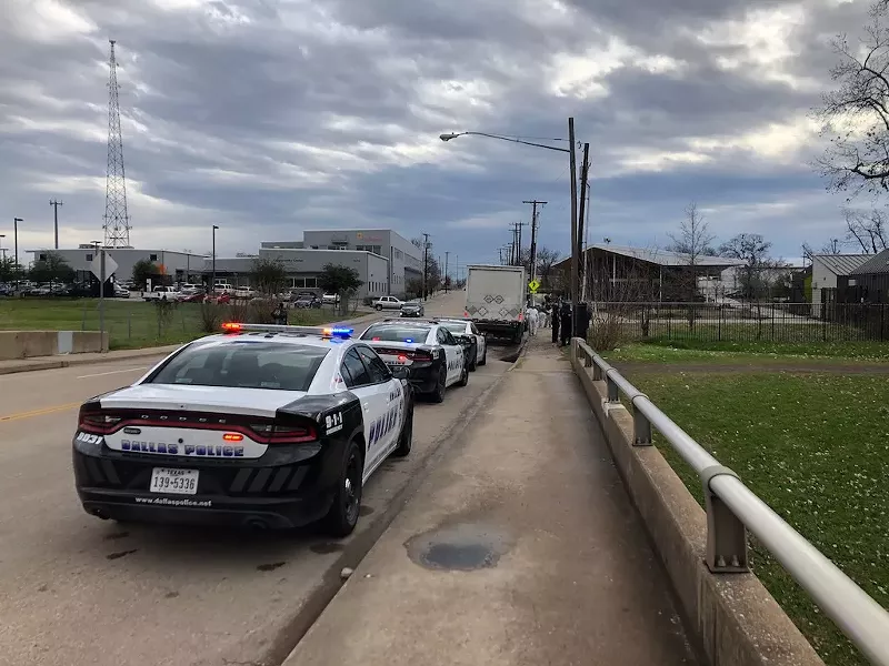 Image: Dallas Police officers assist in a homeless encampment sweep late in 2019. A KPMG report has questioned the department's allocation of resources.