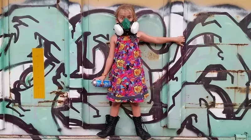 Image: Nine-year-old artist Gia Woodrum paints portraits and uses the money she raises from auctioning her art to buy food and clothes for Dallas' homeless.