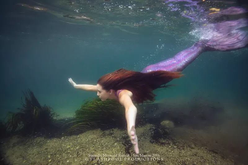 Image: High school student Chelbi Pena has an unusual summer job: pretending to be a mermaid.
