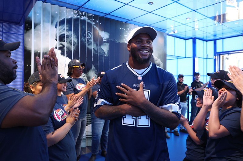 Parsons receives a warm welcome at the Dallas Cowboys and Post Malone-themed Raising Cane's in Dallas.