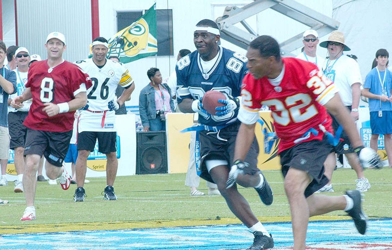 Michael Irvin, with football, in Hawaii in 2006.