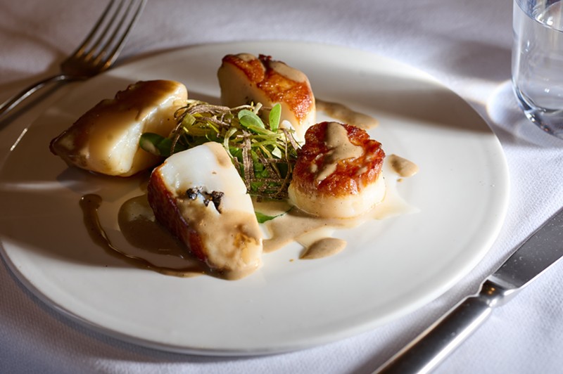 We spoke to chef RJ Yoakum at Georgie (where these scallops poêlée with melted leek and spinach puree were made) about Texas being added as a Michelin Guide State.