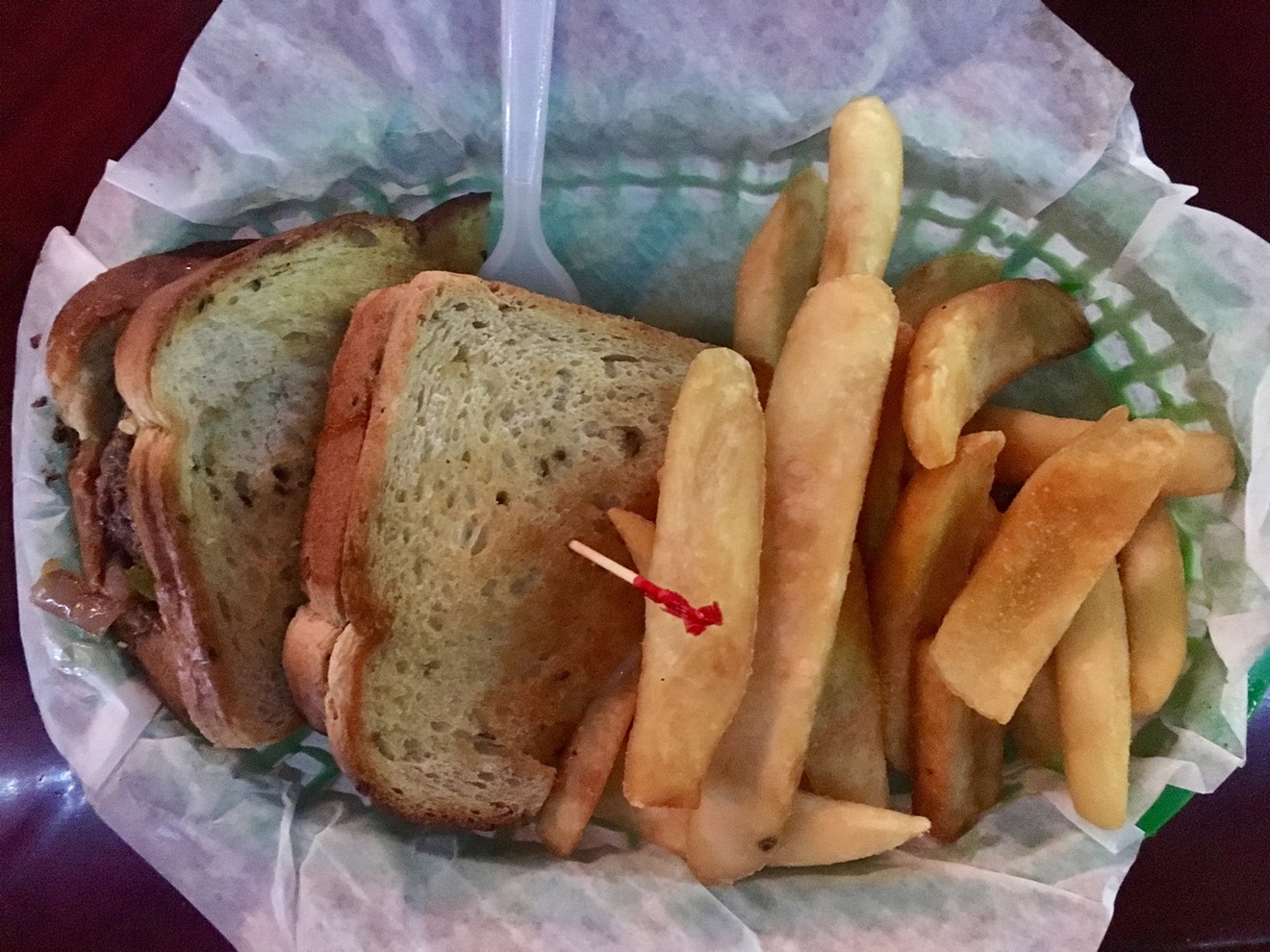 Milo's Penny Melt, a griddled beef sandwich with melted Swiss and onions, on buttered rye for $6.99.