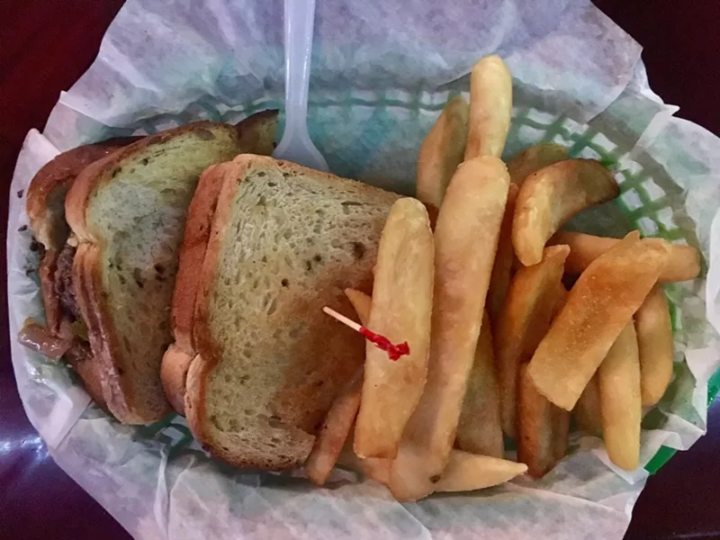 Image: Milo's Penny Melt, a griddled beef sandwich with melted Swiss and onions, on buttered rye for $6.99.