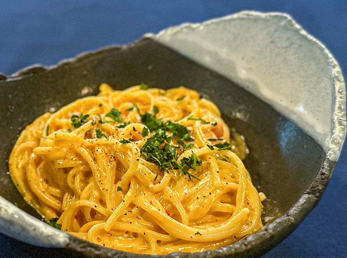 Kimchi carbonara pasta with house-cured guanciale is just one of Chef Akira Imamura's new Japanese/Italian fusion offerings.