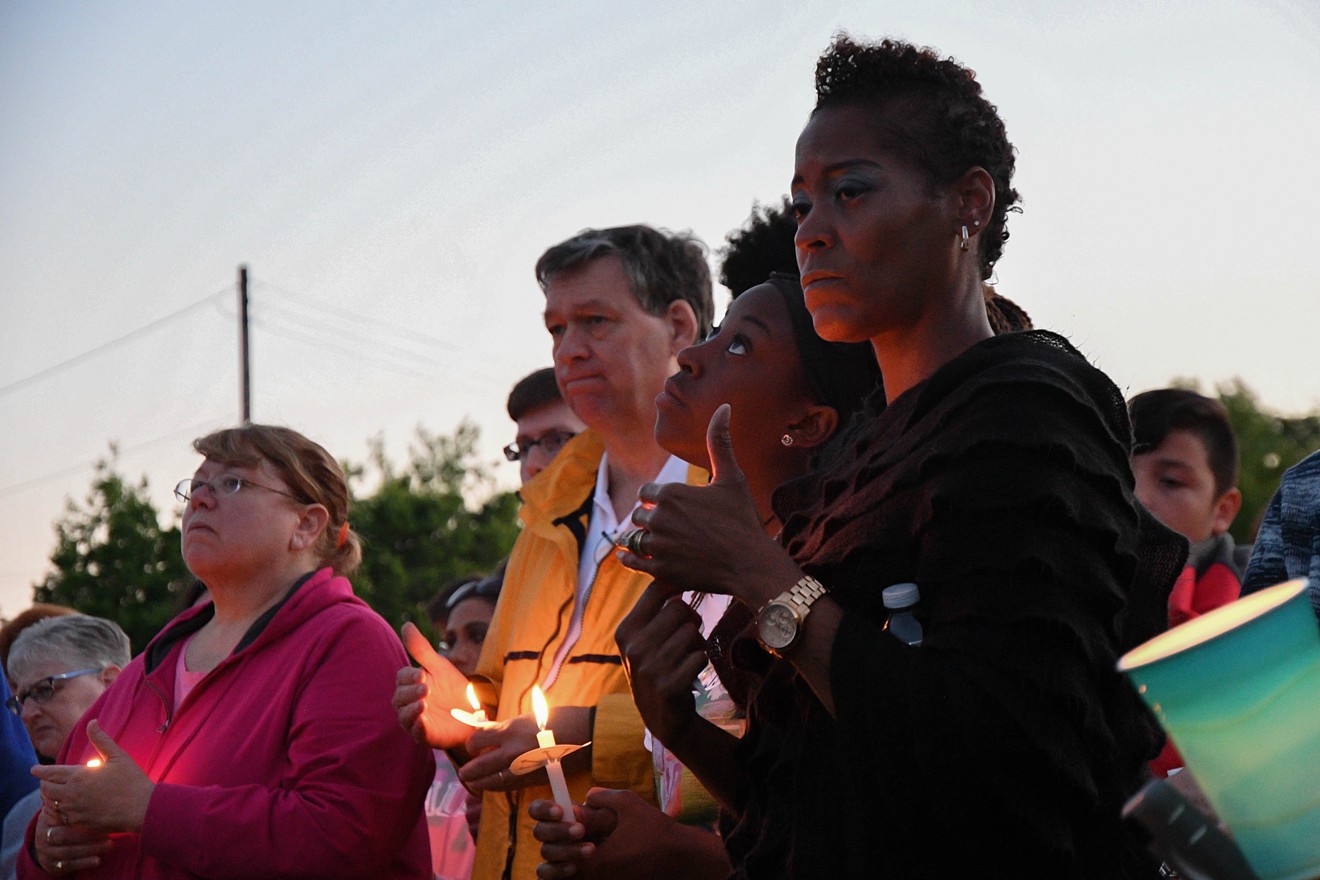 Mourners attend a vigil for Jordan Edwards, a 15-year-old Mesquite high school student killed by a Balch Springs police officer last Saturday night.