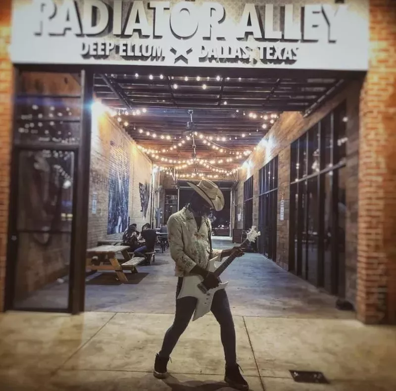 Image: Jay Knox plays K-pop and metal in the Deep Ellum streets, then sleeps by the river by night in his car.