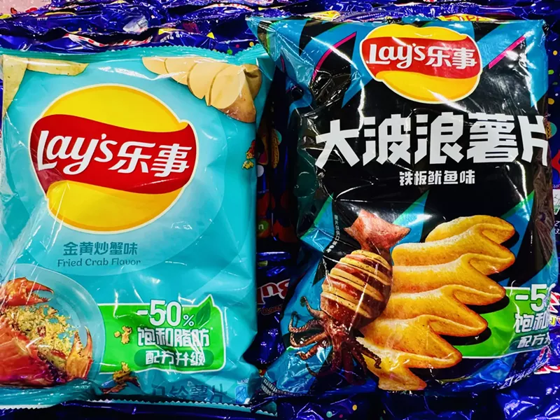 Image: Fried crab Lay's (left) and sizzling squid (right).