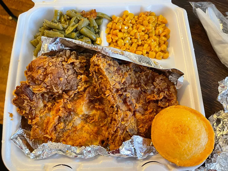 Image: Two thick-cut, fried pork chops come to an order.