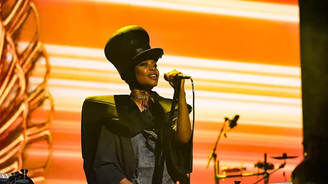 Woman singing on stage