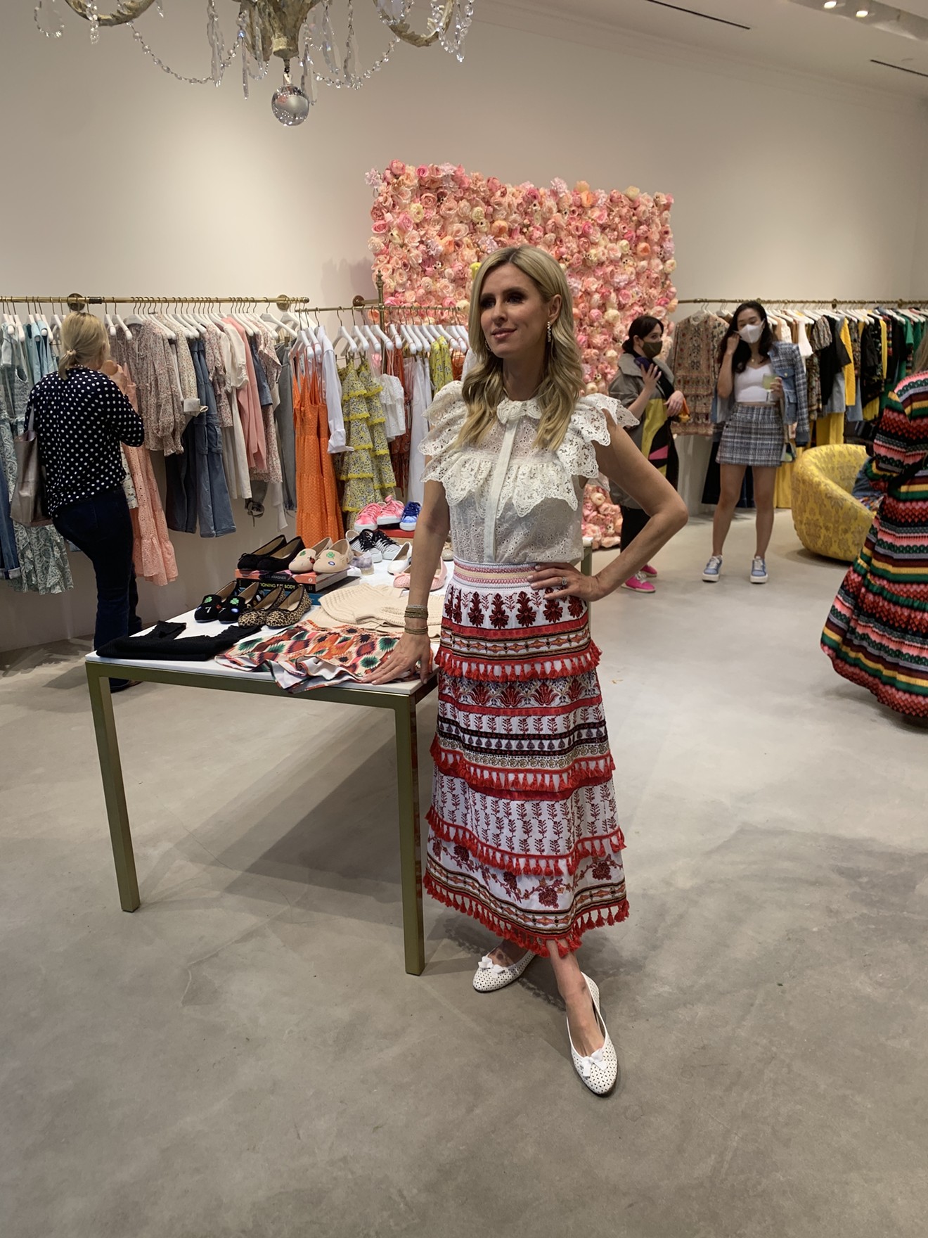 Nicky Hilton poses in front of her shoe line at Alice + Olivia in Highland Park Village.