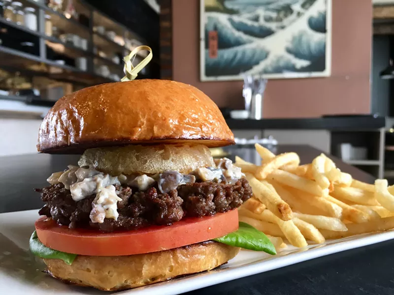 Image: The house-ground burger with a tempura onion ring is a standout on Niwa's forthcoming lunch menu.