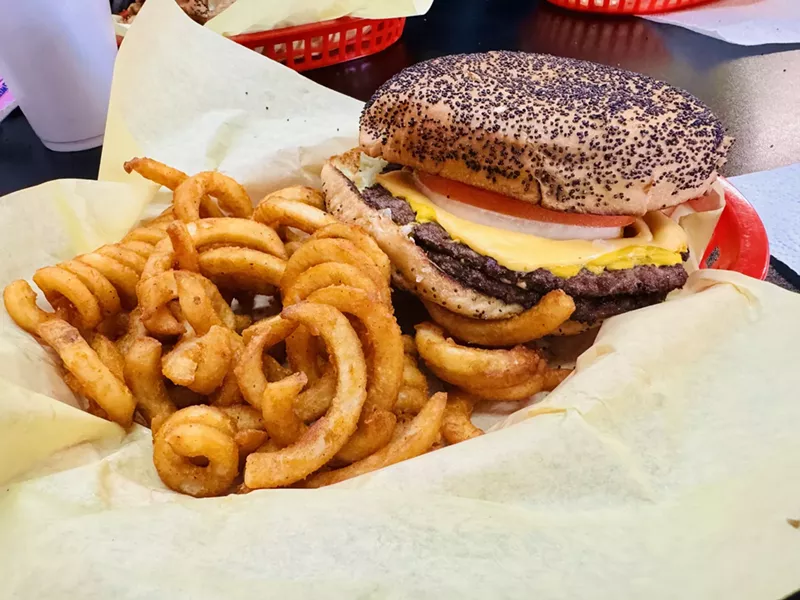 Image: Flaming Burger's double cheeseburger and curly fries.