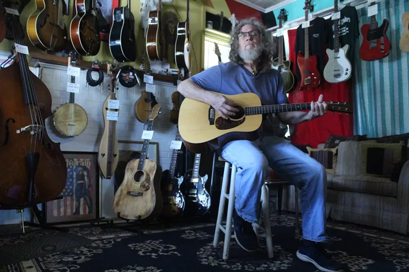 Image: For 20 years, luthier Gregory Lange of Little D Guitars has serviced stringed instruments for local musicians.