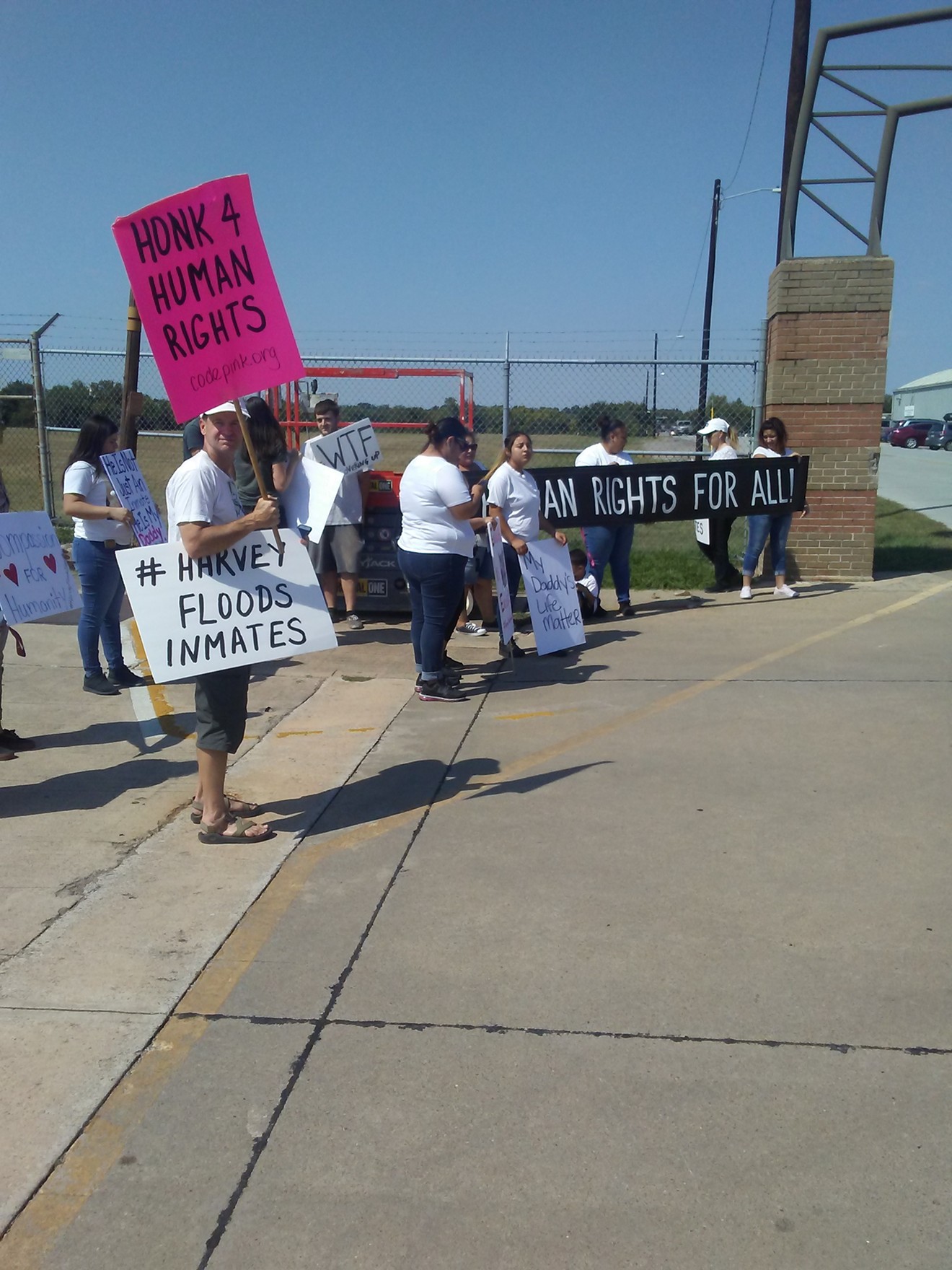 Protesters say the conditions inside the federal prison in Beaumont are unacceptable.