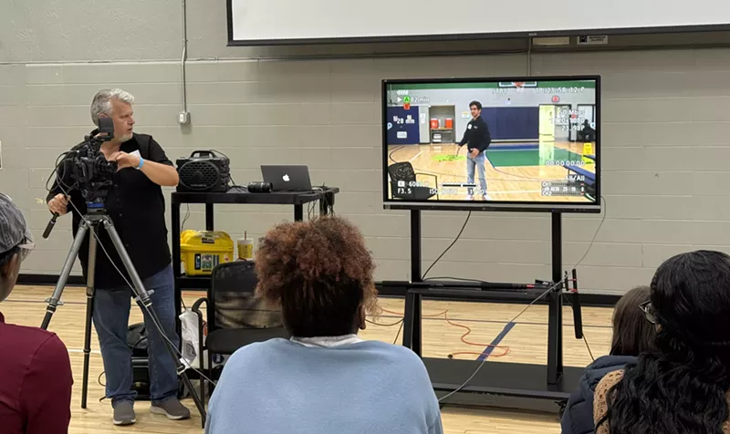 Image: Filmmaker Eric Jewell demonstrates how to use a camera for students at the Oak Cliff Film Festival workshop.