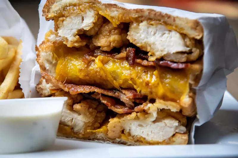 Image: This is the CBR from Plano Grilled Cheese ($13) made with cheddar cheese, chicken tenders, bacon and ranch; it will surely fix whatever needs fixing.