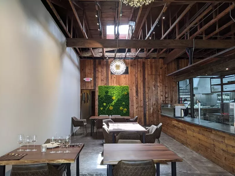 Image: The dining room at Carte Blanche on Greenville Avenue, highlighted by baker Amy La Rue's artwork made from moss. More art will arrive before the June 15 opening.