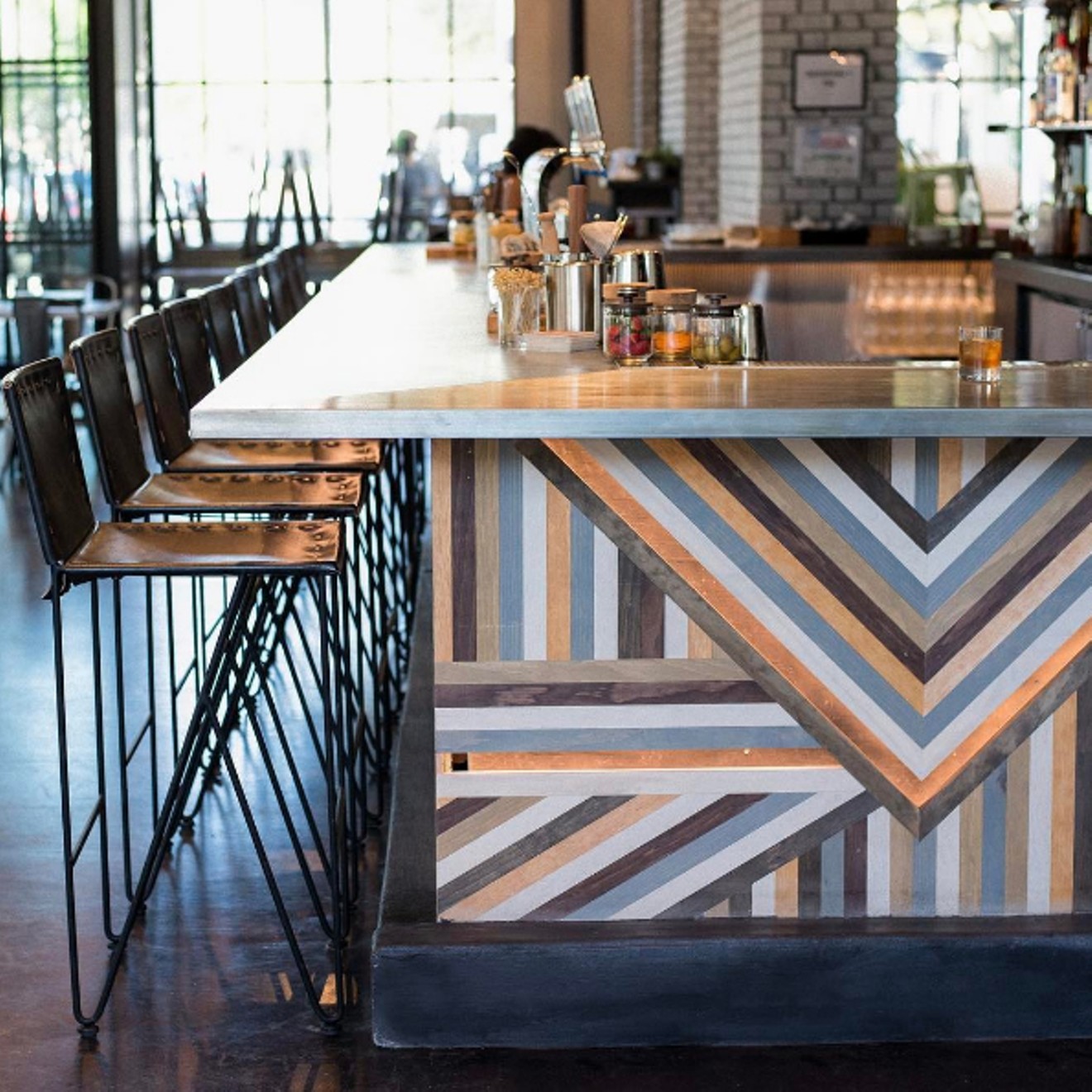 Wheelhouse's bar features "custom-designed, Scandinavian-inspired wood inlay and Garza Marfa leather barstools. (We are in the Design District, after all)," according to the restaurant's Instagram.
