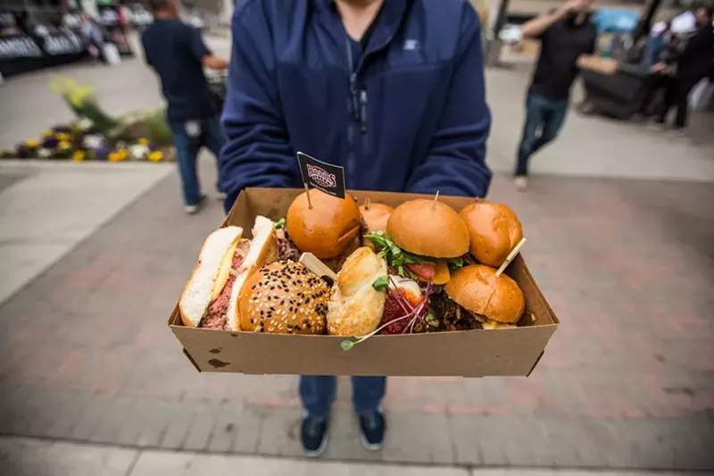 Image: About 2,000 people chowed down on unlimited sliders at Saturday's Between the Buns event at the Dallas Farmers Market.